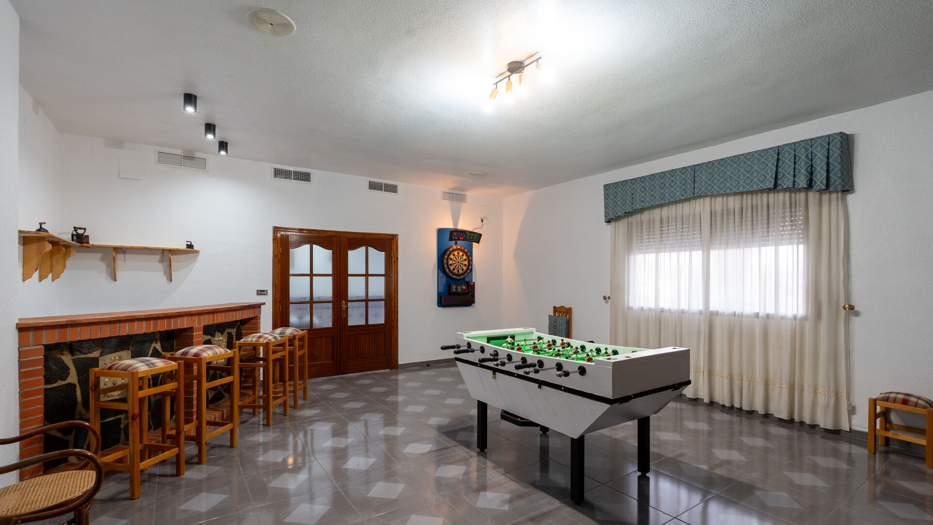 Sala de ocio con futbolín